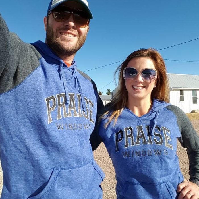 The Praise Windows team in matching hoodies