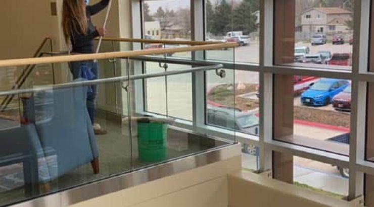 Washing windows at a hospital during COVID